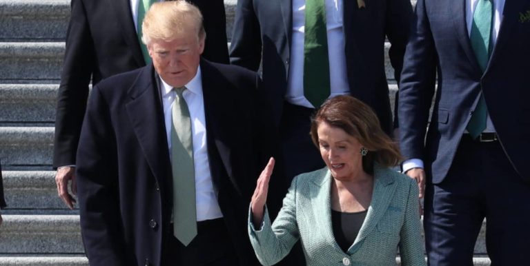 FILE PHOTO: U.S. President Donald Trump walks down the U.S Capitol steps with Speaker of the House Nancy Pelosi (D-CA) after they both attended the 37th annual Friends of Ireland luncheon at the U.S. Capitol in Washington, U.S., March 14, 2019. REUTERS/Jonathan Ernst