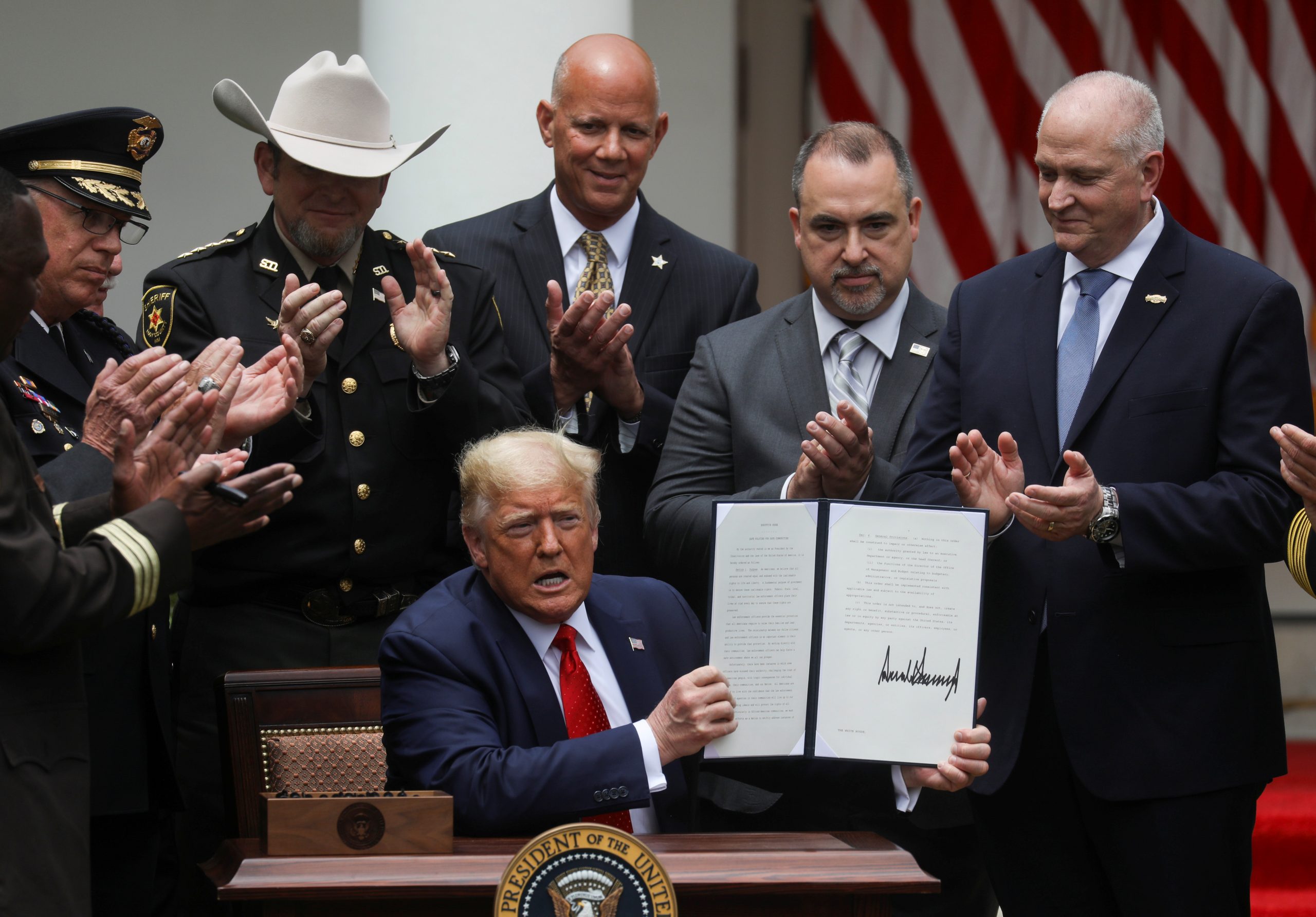 Trump Signs Order on Police Reform After Weeks of Protests About Racial Injustice