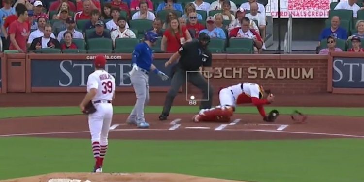 Cardinals catcher Willson Contreras reeled after getting clipped in the head by a bat swung by Chicago Cubs' Ian Happ during a game Thursday.