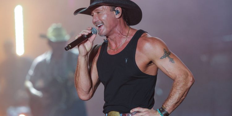 Tim McGraw Shares Thoughts on Fans Throwing Items on Stage