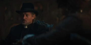 In this screenshot from the new “Haunted Mansion” trailer, Owen Wilson, who plays Father Kent in the movie, is seen in conversation with another character.