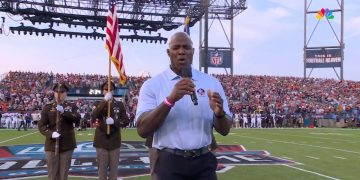 NFL Hall of Fame Demarcus Ware sings the Star Spangled Banner at the Hall of Fame game at Tom Benson Hall of Fame Stadium in Canton, Ohio, on Thursday.