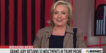 Former Secretary of State Hillary Clinton laughed at the upcoming indictment charges against former President Donald Trump for a fourth time during an interview with Rachel Maddow on MSNBC. (Screenshot/MSNBC/YouTube)