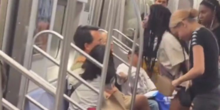Three teenage girls were filmed attacking a Nevada family on the F train in New York City on Thursday.