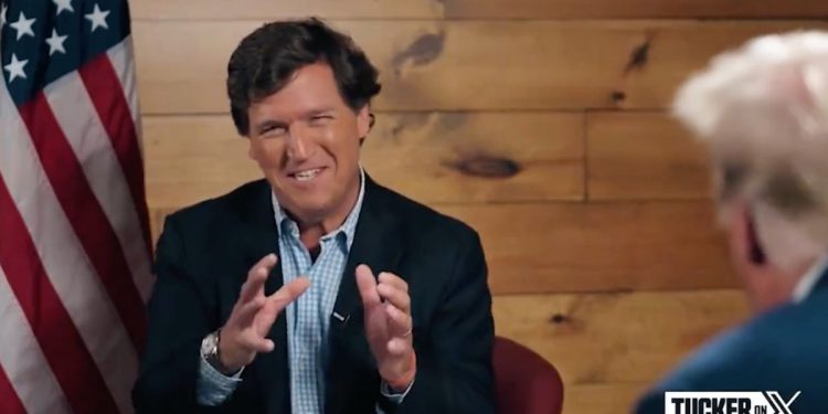 During his interview with former President Donald Trump on Wednesday, Tucker Carlson took verbal shots at former Fox colleague Chris Wallace.