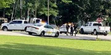 The scene outside a home in Henderson, Tennesee, where a man was shot to death during an Aug. 16 police raid.