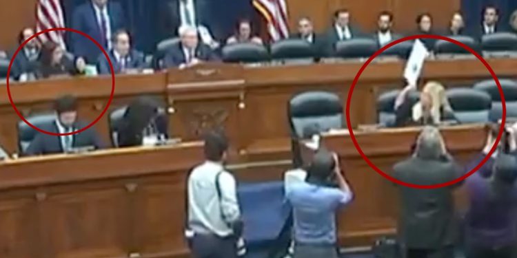 Reps. Alexandria Ocasio-Cortez, circled left, and Marjorie Taylor Greene, circled right, got into a heated exchange during the House Oversight and Accountability Committee’s first hearing on the impeachment inquiry into President Biden on Thursday.