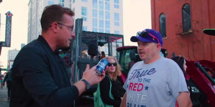 Benny Johnson stood on Broadway Street in Nashville, offering free Bud Lights to people on the street, but no one wanted to accept the free beverage.