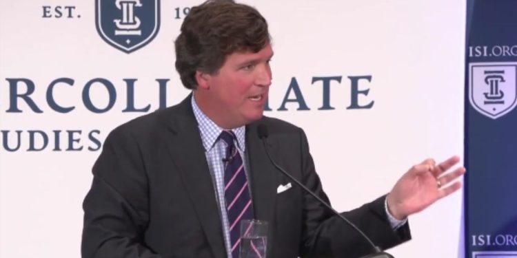 Tucker Carlson speaks on Thursday in Wilmington, Delaware.