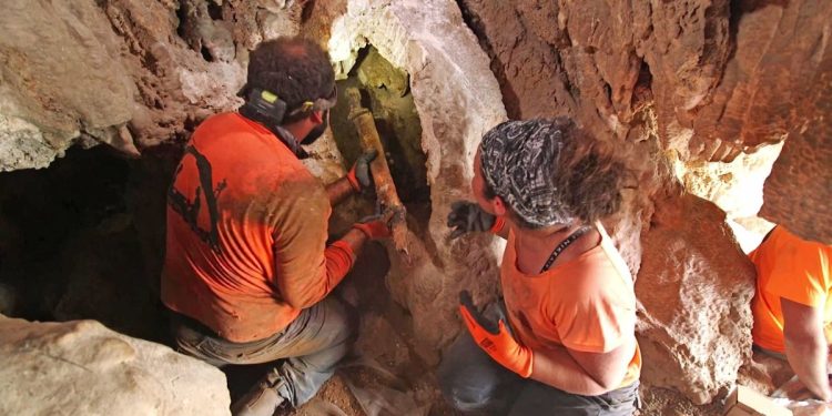 Israeli archaeologists discovered four ancient swords and a shafted weapon in a cave in the Judean desert.