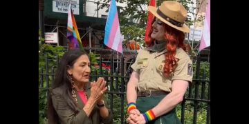 Interior Secretary Deb Haaland with a park ranger identified as "Pattie Gonia."