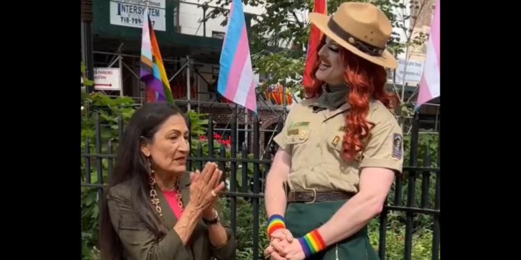 Interior Secretary Deb Haaland with a park ranger identified as "Pattie Gonia."