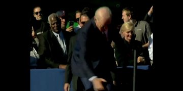 This Twitter screen shot shows U.S. President Joe Biden stumbling as he climbs a flight of stairs onto a stage in Philadelphia.
