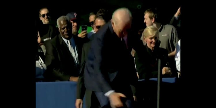 This Twitter screen shot shows U.S. President Joe Biden stumbling as he climbs a flight of stairs onto a stage in Philadelphia.