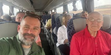 Rep. Cory Mills, a Florida Republican, is pictured with Americans getting out of Israel after the surprise Hamas attack on Saturday ignited war.