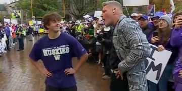 University of Washington student Greyson Wilhelm and ESPN "College GameDay" host Pat McAfee.