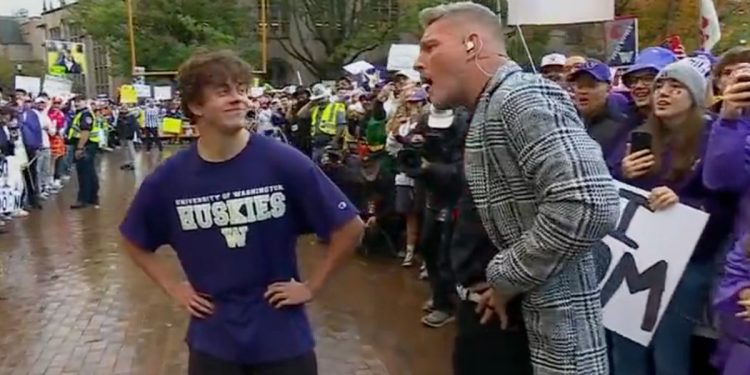 University of Washington student Greyson Wilhelm and ESPN "College GameDay" host Pat McAfee.