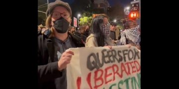 Protesters march in New York City to support Palestinian rights.
