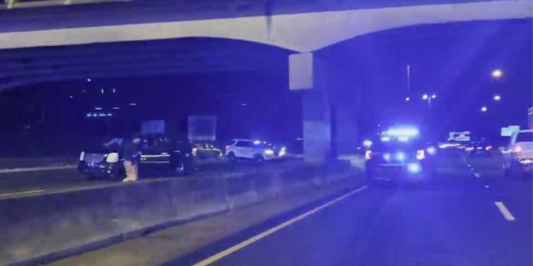 police at a crime scene on an Alabama interstate