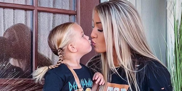 Lunden Roberts, right, is pictured with her daughter, Navy Joan, left. Roberts recently wrote an Op-Ed, where she explained why she has never publicly criticized Hunter Biden as a father.