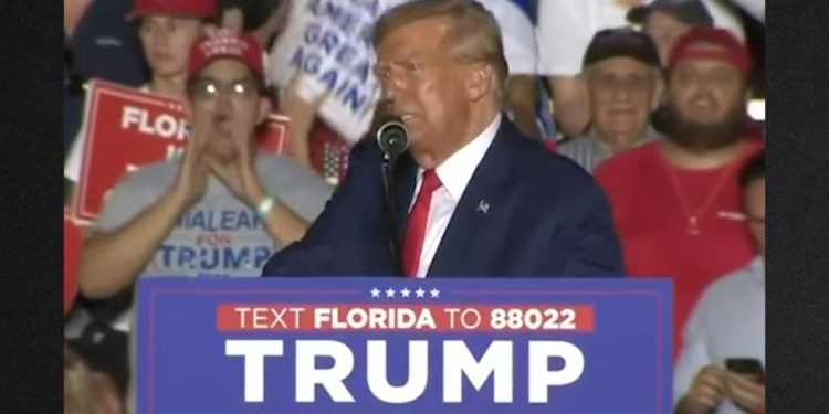 Former President Donald Trump appeared surprised at hearing boos after he mentioned the politician's name.