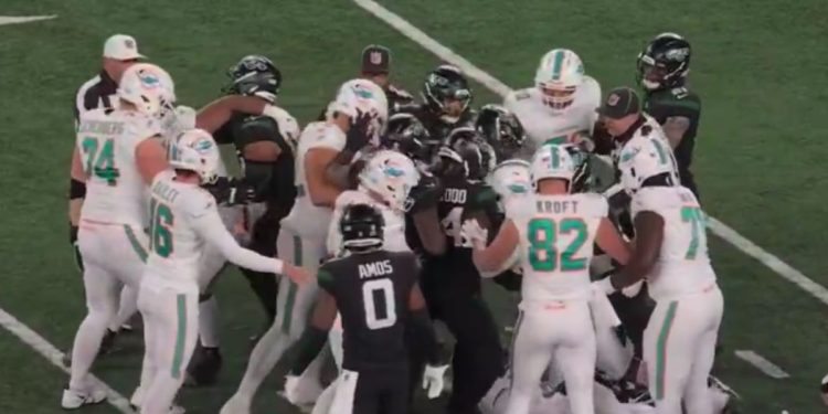 This Twitter screen shot shows a scuffle that broke out between Miami Dolphins and New York Jets players during an NFL game on Black Friday 2023.
