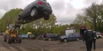 An alleged car thief was trapped by someone using a forklift.