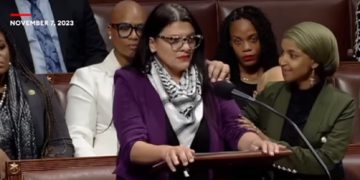 Rep. Ilhan Omar comforts Rep. Rashida Tlaib as Tlaib spoke on the House floor on Tuesday.
