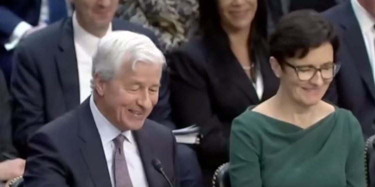 During a Wednesday Senate Banking Committee Hearing, Sen. John Kennedy made a joke referencing Alec Baldwin, causing JP Morgan Chase CEO Jamie Dimon, left, to laugh.