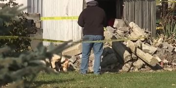 The teen's body was found under some rubble in the neighbor's yard.