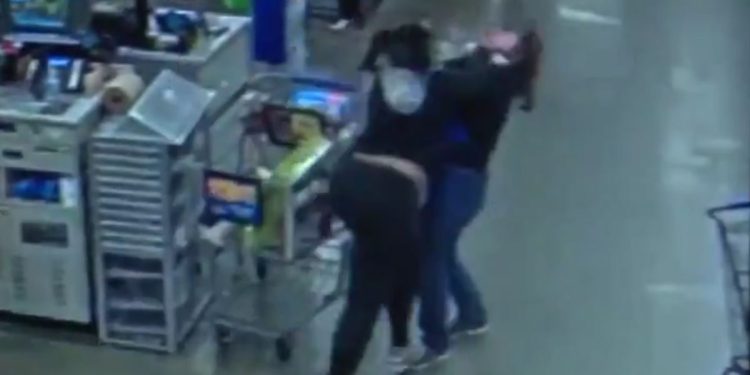 This Twitter screen shot shows the confrontation between a Michigan mother and a store clerk.