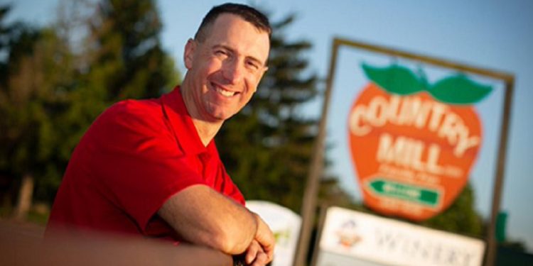 Stephen Tennes, owner of the Country Mill orchard in Charlotte, Michigan.