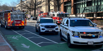 US Secret Service vehicles block access to a street leading to the Embassy of Israel in Washington, DC on February 25, 2024. A man reportedly set himself on fire near the embassy on Sunday afternoon. (Photo by Mandel NGAN / AFP) (Photo by MANDEL NGAN/AFP via Getty Images)