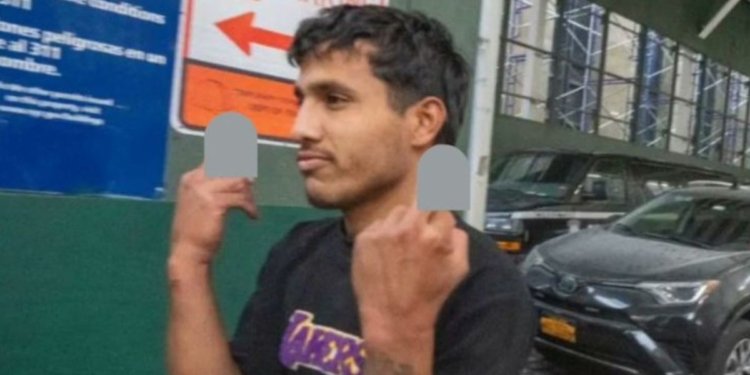 Jhoan Boada, one of the men suspected of attacking two NYPD officers in Times Square, "saluted" onlookers upon leaving court on Jan. 31. The charges against him have since been dropped.