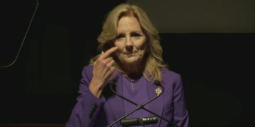 Jill Biden being interrupted during a campaign speech
